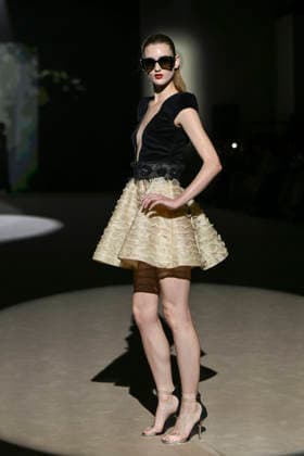 Hannibal Laguna - Mercedes-Benz Fashion Week Madrid in Madrid, Spain - 20 Mar 2026 A model walks the runway wearing a design by Hannibal Laguna during Mercedes-Benz Fashion Week de Madrid in IFEMA. Madrid Spain Copyright: xAtilanoxGarciax xSOPAxImagesx photos09639