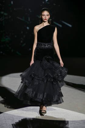 Hannibal Laguna - Mercedes-Benz Fashion Week Madrid in Madrid, Spain - 20 Mar 2026 A model walks the runway wearing a design by Hannibal Laguna during Mercedes-Benz Fashion Week de Madrid in IFEMA. Madrid Spain Copyright: xAtilanoxGarciax xSOPAxImagesx photos09640