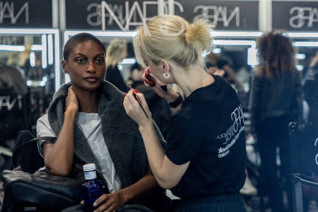 Fely Campos fashion show at Mercedes Benz Fashion Week Make-up artist applies make-up to a model backstage at Fely Campos fashion show on the occasion of Mercedes Benz Fashion Week, March 21, 2026, in Madrid Spain Fely Campo is a firm that stands out for the precision of its patterns and its refined style Its fashion show is part of the Mercedes Benz Fashion Week Madrid, the main Spanish fashion show organized by IFEMA, which brings together established firms and new talent MARCH 21, 2026 FASHION Madrid Madrid Spain  Copyright: xRicardoxRubiox 7384958