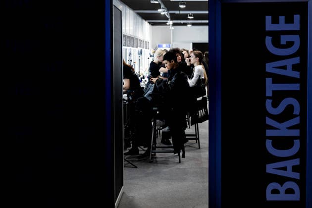 Fely Campos fashion show at Mercedes Benz Fashion Week Make-up artist applies make-up to a model backstage at Fely Campos fashion show on the occasion of Mercedes Benz Fashion Week, March 21, 2026, in Madrid Spain Fely Campo is a firm that stands out for the precision of its patterns and its refined style Its fashion show is part of the Mercedes Benz Fashion Week Madrid, the main Spanish fashion show organized by IFEMA, which brings together established firms and new talent MARCH 21, 2026 FASHION Madrid Madrid Spain  Copyright: xRicardoxRubiox 7384959
