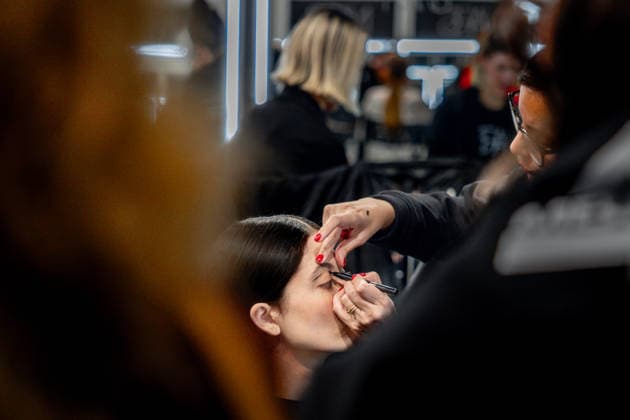 Fely Campos fashion show at Mercedes Benz Fashion Week Make-up artist applies make-up to a model backstage at Fely Campos fashion show on the occasion of Mercedes Benz Fashion Week, March 21, 2026, in Madrid Spain Fely Campo is a firm that stands out for the precision of its patterns and its refined style Its fashion show is part of the Mercedes Benz Fashion Week Madrid, the main Spanish fashion show organized by IFEMA, which brings together established firms and new talent MARCH 21, 2026 FASHION Madrid Madrid Spain  Copyright: xRicardoxRubiox 7384962