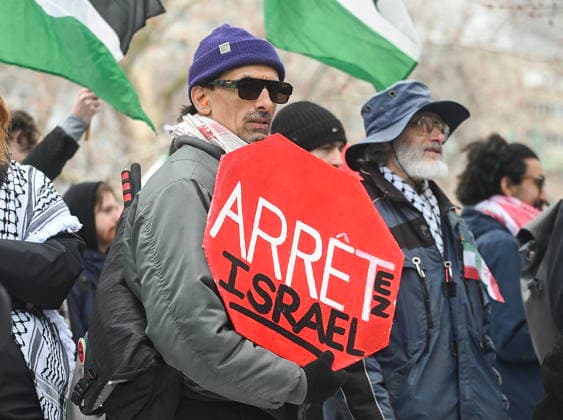 March 21, 2026, Montreal, Pq, Canada: People take part in a protest against the U.S. and Israeli war against Iran and Lebanon in Montreal, Saturday, March 21, 2026. Montreal Canada  - ZUMAc35_ 20260321_zaf_c35_060 Copyright: xGrahamxHughesx