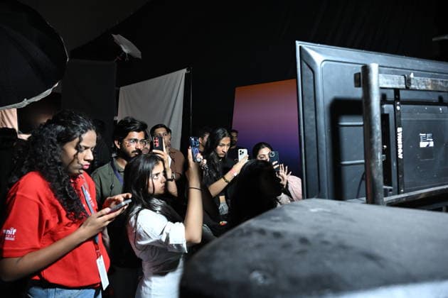 March 21, 2026, Mumbai, Maharashtra, India: Volunteers are seen recording the models walking on the runway on a television kept at backstage at the Lakme Fashion Week (LFW) in Mumbai. Mumbai India - ZUMAs197 20260321_aaa_s197_103 Copyright: xAshishxVaishnavx
