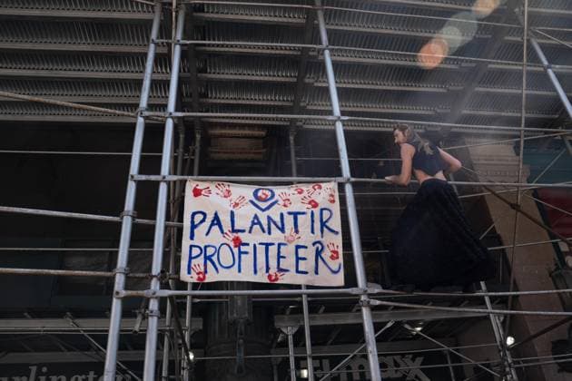 March 21, 2026, New York, New York, USA: Dozens of activists rally at AIDS Memorial in New York, NY on March 21, 2026, marched, held the rally and die-in outside of 620 6th Avenue where offices of Palantir located. Activists accused Palantir of profiting by working for ICE and Department of War. New York USA - ZUMAr339 20260321_znp_r339_034 Copyright: xLevxRadinx