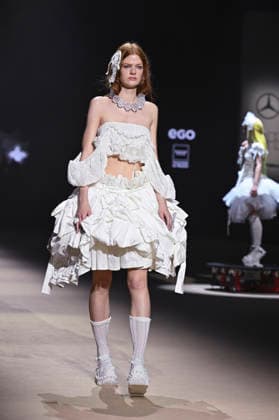 Mercedes-Benz Fashion Week Madrid in Spain - 22 Mar 2026 A model walks the runway wearing a design by Mericusan during Mercedes-Benz Fashion Week de Madrid in IFEMA. Madrid Spain Copyright: xAtilanoxGarciax xSOPAxImagesx photos10236