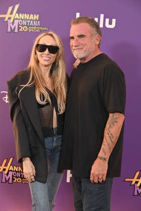 Hannah Montana 20th Anniversary Special LOS ANGELES, CALIFORNIA - MARCH 23 Tish Cyrus and Dominic Purcell at the World Premiere of Disney+ s Hannah Montana 20th Anniversary Special at El Capitan Theatre on March 23, 2026 in Los Angeles, California.Credit: Michael Mattesr AdMedia EDITORIAL USE ONLY  Copyright: xx AdMediax admphotostwo977027