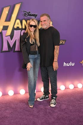 Hannah Montana 20th Anniversary Special LOS ANGELES, CALIFORNIA - MARCH 23 Tish Cyrus and Dominic Purcell at the World Premiere of Disney+ s Hannah Montana 20th Anniversary Special at El Capitan Theatre on March 23, 2026 in Los Angeles, California.Credit: Michael Mattesr AdMedia EDITORIAL USE ONLY  Copyright: xx AdMediax admphotostwo977052