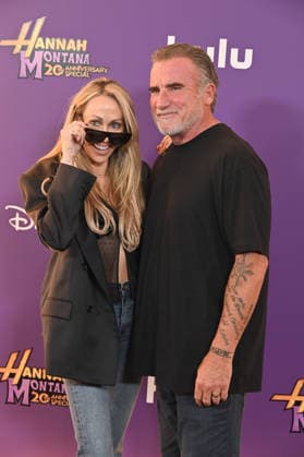 Hannah Montana 20th Anniversary Special LOS ANGELES, CALIFORNIA - MARCH 23 Tish Cyrus and Dominic Purcell at the World Premiere of Disney+ s Hannah Montana 20th Anniversary Special at El Capitan Theatre on March 23, 2026 in Los Angeles, California.Credit: Michael Mattesr AdMedia EDITORIAL USE ONLY  Copyright: xx AdMediax admphotostwo977069