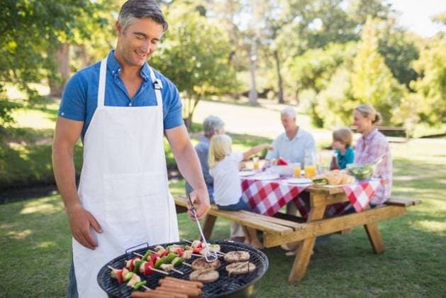 Happy man doing barbecue for his family Happy man doing barbecue for his family in a sunny day, model released, Cape Town, South Africa, 24.03.2015, 511818.jpg, park, countryside, nature, sunny, sunshine, summer, spring, lifestyle, leisure, fair hair, blonde, light hair, short hair, relaxing, content, happy, smiling, cheerful, love, affection, family, together, cute, childhood, family with two children, two parents, mother, father, daughter, son, grandparent, multi-generation family, recreational pursuit, weekend activities, barbecue, al fresco, lunch, meal, picnic table Child, Boy, Male, Caucasian, 40s, Mature Adult, Man, 60s, Senior, Elderly, 70s, Woman, Female, 30s, Mid Adult, Girl, 10-11 Years, Boys, Caucasian Ethnicity, 40-44 Years,