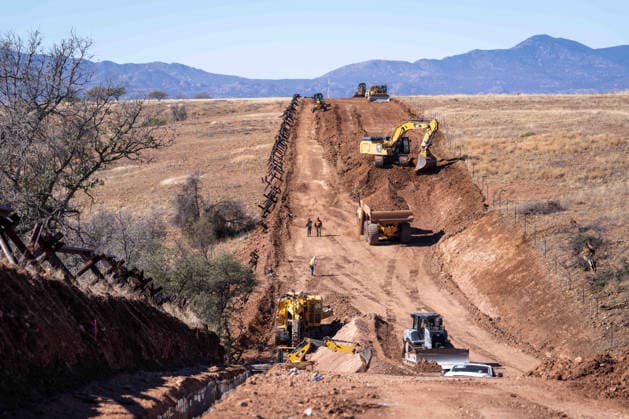 March 24, 2026, Sierra Vista, Az, United States: Workers cut a road through a the Coronado National Memorial along where the new border wall system separating Mexico from the United States will be constructed, January 15, 2026, southwest of Sierra Vista, Arizona. Trump has spent nearly 8 billion dollars building the wall making it the most expensive public works project in history. Sierra Vista United States - ZUMAp138 20260324_zaa_p138_008 Copyright: xJerryxGlaser Cbpx