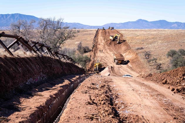 March 24, 2026, Sierra Vista, Az, United States: Workers cut a road through a the Coronado National Memorial along where the new border wall system separating Mexico from the United States will be constructed, January 15, 2026, southwest of Sierra Vista, Arizona. Trump has spent nearly 8 billion dollars building the wall making it the most expensive public works project in history. Sierra Vista United States - ZUMAp138 20260324_zaa_p138_009 Copyright: xJerryxGlaser Cbpx
