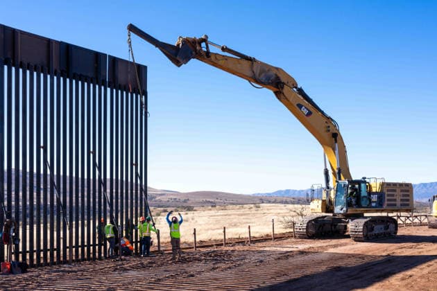 March 24, 2026, Sierra Vista, Az, United States: Workers install prefabricated panels as part of the new border wall system construction separating Mexico from the United States, January 15, 2026, southwest of Sierra Vista, Arizona. Trump has spent nearly 8 billion dollars building the wall making it the most expensive public works project in history. Sierra Vista United States - ZUMAp138 20260324_zaa_p138_013 Copyright: xJerryxGlaser Cbpx