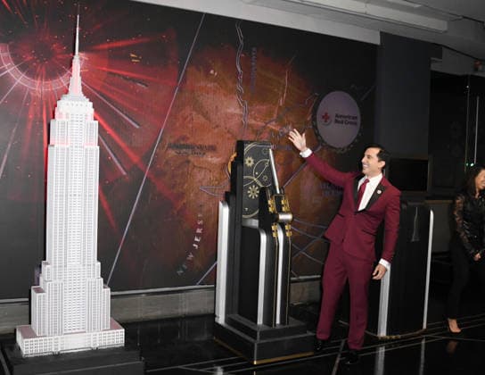 NEW YORK,NY - MARCH 24: Alejandro Condis lights the Empire State Building in Honor of Red Cross Giving Day in New York City on March 24, 2026. Copyright: xmpi099 MediaPunchx