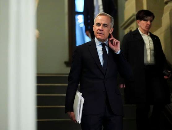 March 25, 2026, Ottawa, Canada: Prime Minister Mark Carney turns his ear towards reporters questions as he arrives to a caucus meeting on Parliament Hill in Ottawa on Wednesday, March 25, 2026. Ottawa Canada  - ZUMAc35_ 20260325_zaf_c35_015 Copyright: xSeanxKilpatrickx