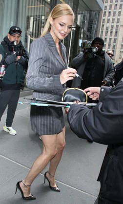 NEW YORK, NY - MARCH 25: Heather Graham seen exiting SiriusXM Studios in New York City on March 25, 2026. Copyright: xRWx