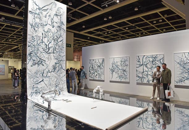 (260326) -- HONG KONG, March 26, 2026 -- Visitors view exhibits at the preview of Art Basel Hong Kong 2026 at the Hong Kong Convention and Exhibition Center in south China s Hong Kong, March 25, 2026. Art Basel Hong Kong 2026 held its preview here on Wednesday, bringing together 240 galleries from 41 countries and regions. Featuring six themed sectors and programs, the fair will open to the public from Friday to Sunday. ) CHINA-HONG KONG-ART BASEL-PREVIEW (CN) ChenxDuo 