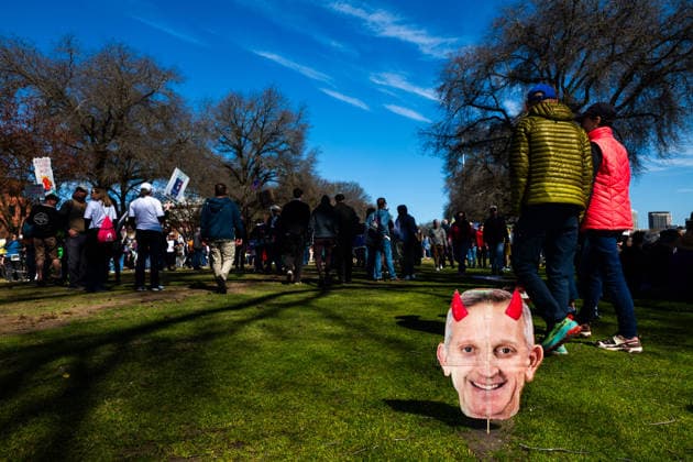 March 28, 2026, Portland, Oregon, USA: A cardboard cutout depicting Portland Mayor KEITH WILSON with devil horns rests in the grass at Tom McCall Waterfront Park during the No Kings 3 rally on Saturday, March 28, 2026 in Portland, Oregon. Portland USA - ZUMAh206 20260328_znp_h206_004 Copyright: xBenjaminxHansonx