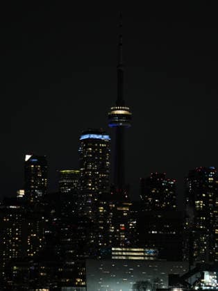 Toronto’s CN Tower Dims for Earth Hour TORONTO, CANADA - MARCH 28: The CN Tower is seen with its exterior lights dimmed during Earth Hour as part of a global movement to protect the environment in Toronto, Canada, on March 28, 2026. Mert Alper Dervis Anadolu Ontario Canada. Editorial use only. Please get in touch for any other usage.  Copyright: x2026xAnadoluxMertxAlperxDervisx
