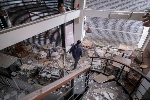 U.S.-Israeli Military Campaign In Iran A young Iranian man walks among the ruins of his cafe, which was destroyed in an airstrike that struck a commercial-office building where the Qatari Al-Araby TV office is located, in a residential area in Tehran, Iran, on March 29, 2026. Tehran Tehran Iran  Copyright: xMortezaxNikoubazlx originalFilename: nikoubazl-usisrael260329_npR39.jpg