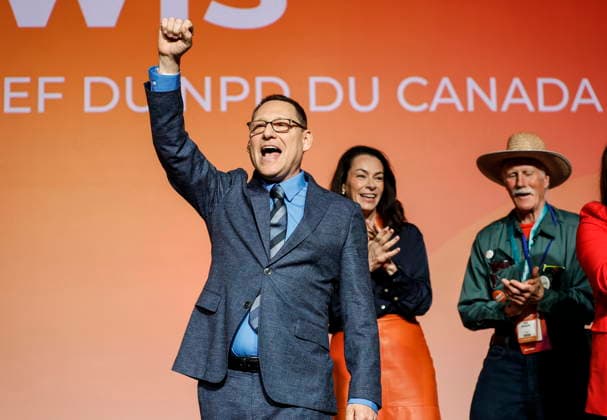 March 29, 2026, Winnipeg, Manitoba, CANADA: Avi Lewis, who was proclaimed as the new leader of the NDP, greets the crowd as candidates Heather McPherson and Tony McQuail look on at the party convention in Winnipeg Sunday, March 29, 2026. Winnipeg CANADA  - ZUMAc35_ 20260329_zaf_c35_011 Copyright: xJohnxWoodsx