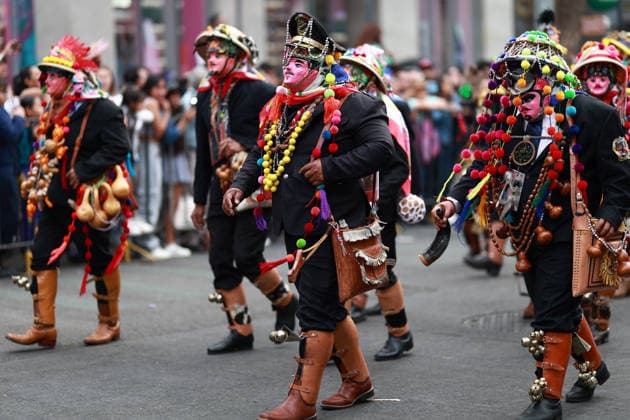 Large-scale carnival parade in Mexico City MEXICO CITY, MEXICO - MARCH 29: Masked men in traditional costume participate in a large-scale carnival parade, in Mexico City, Mexico on March 29, 2026. More than 7,000 participants from neighborhoods across Mexico City, dressed in colorful attire linked to Mexico s carnival traditions, paraded through the capital s historic center in an event called Carnaval de Carnavales . Daniel Cardenas Anadolu Mexico City Mexico. Editorial use only. Please get in touch for any other usage.  Copyright: x2026xAnadoluxDanielxCardenasx
