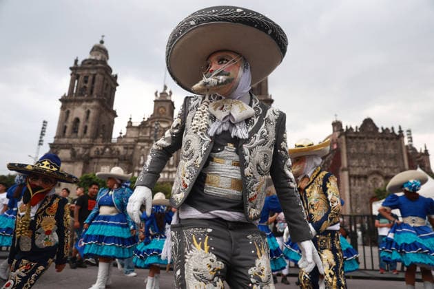 Large-scale carnival parade in Mexico City MEXICO CITY, MEXICO - MARCH 29: A masked man in traditional costume participates in a large-scale carnival parade, in Mexico City, Mexico on March 29, 2026. More than 7,000 participants from neighborhoods across Mexico City, dressed in colorful attire linked to Mexico s carnival traditions, paraded through the capital s historic center in an event called Carnaval de Carnavales . Daniel Cardenas Anadolu Mexico City Mexico. Editorial use only. Please get in touch for any other usage.  Copyright: x2026xAnadoluxDanielxCardenasx