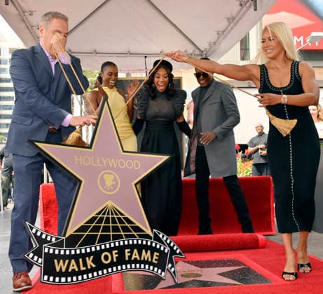 Singer, songwriter and actress Brandy (C) reacts during an unveiling ceremony honoring her with the 2,839th star on the Hollywood Walk of Fame in Los Angeles on Monday, March 30, 2026.  LAP2026033002 JIMxRUYMEN