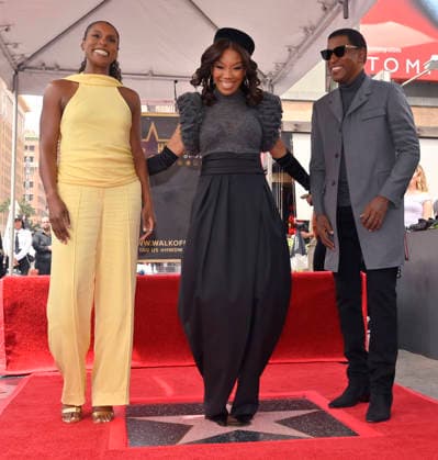 Singer, songwriter and actress Brandy (C) is joined by actress Issa Rae (L) and singer Babyface during an unveiling ceremony honoring her with the 2,839th star on the Hollywood Walk of Fame in Los Angeles on Monday, March 30, 2026.  LAP2026033006 JIMxRUYMEN