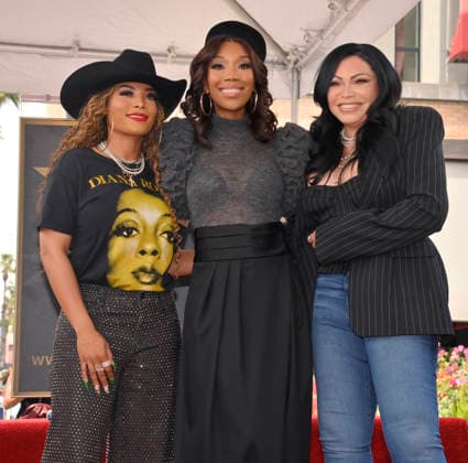 Singer, songwriter and actress Brandy (C) is joined by Dani Wright (L) and Tisha Campbell during an unveiling ceremony honoring her with the 2,839th star on the Hollywood Walk of Fame in Los Angeles on Monday, March 30, 2026.  LAP2026033019 JIMxRUYMEN