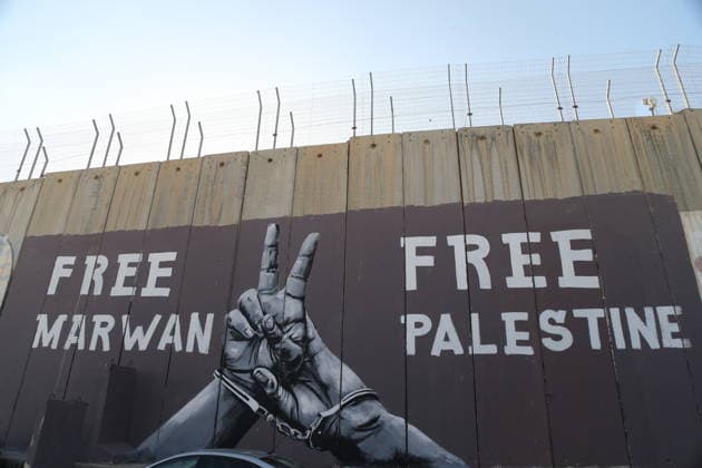Graffiti supporting Palestinian prisoners appears on separation wall BETHLEHEM, PALESTINE- MARCH 31: Graffiti supporting Palestinian prisoners is painted on Israel’s separation wall between Jerusalem and Bethlehem, calling for their freedom and protesting Israel’s proposed death penalty for Palestinian detainees in Bethlehem, West Bank, Palestine, on March 31, 2026. Wisam Hashlamoun Anadolu Bethlehem West Bank. Editorial use only. Please get in touch for any other usage.  Copyright: x2026xAnadoluxWisamxHashlamounx
