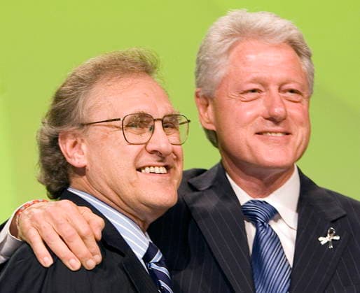 August 15, 2006, Toronto, On, Canada: Former US president Bill Clinton (right) embraces UN Special Envoy for HIV AIDS in Africa Stephen Lewis after speaking at the 16th World Aids Conference in Toronto on Tuesday August 15, 2006. (CP PHOTO ) Toronto Canada  - ZUMAc35_ 20060815_zaf_c35_001 Copyright: xFrankxGunnx
