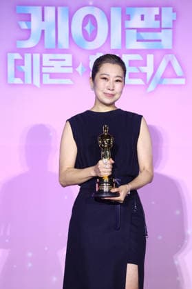 Oscar-winning KPop Demon Hunters directors Oscar-winning KPop Demon Hunters directors Maggie Kang, a co-director of the Oscar-winning animated film KPop Demon Hunters, poses for a photo during a press conference in Seoul on April 1, 2026, to mark its wins in the Best Animated Feature and Best Original Song categories with Golden from its original soundtrack at the 98th Academy Awards. (Yonhap) 2026-04-01 15:47:12 < 1980-2026 YONHAPNEWS AGENCY. .> ¼­¿ïÆ¯º°½Ã EDITORIAL USE ONLY  Copyright: xx PYH2026040120080031500 YonhapxNewsx yonphotos251008