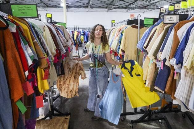 April 2, 2026, St. Pete Beach, Florida, USA: Key costumer Alcee Stoller sorts clothing for extras during preparations for filming the movie Ã¢â‚¬oeThe StatementÃ¢â‚¬Â on Thursday, April 2, 2026, in St. Pete Beach. St. Pete Beach USA  - ZUMAs70_ 20260402_zan_s70_017 Copyright: xDouglasxR.xCliffordx