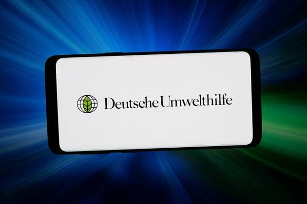 Photo illustration in Germany - 19 Mar 2026 In this photo illustration, the logo of association Deutsche Umwelthilfe e.V. (DUH) is displayed on a smartphone in front of abstract background on computer screen. Germany Copyright: xTimonxSchneiderx xSOPAxImagesx TSCHNEIDER_64735 Deutsche Umwelthilfe P8470081