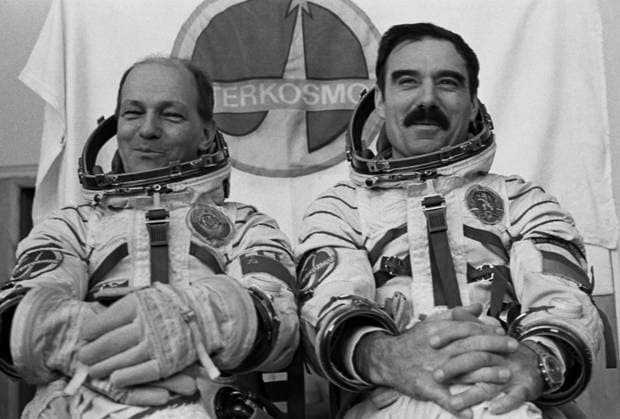 March, 1979. Moscow Region, USSR. Members of the international crew of the Soyuz 33 spacecraft commander, twice Hero of the Soviet Union, Soviet cosmonaut Nikolai Rukavishnikov (L) and cosmonaut of the People™s Republic of Bulgaria, Major Georgi Ivanov pose for a photo during pre-flight preparations at the Gagarin Cosmonaut Training Centre in Zvyozdny Gorodok. The exact date of the photograph is unknown. Albert Pushkarev TASS  15642882