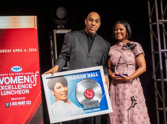 April 4, 2026, Philadelphia, Pennsylvania, United States: DERRICK CORBETT, Senior Vice President of Programming for iHeartMedia holds an award to present to TAMRON HALL, American broadcast journalist, television talk show host and author, receives the WDAS-FM tenth annual Women Of Excellence Legend award at the luncheon held at the Philadelphia Sheraton Philadelphia United States - ZUMArf1_ 20260404_zaf_rf1_029 Copyright: xRickyxFitchettx