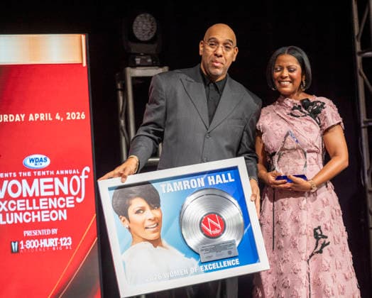 April 4, 2026, Philadelphia, Pennsylvania, United States: DERRICK CORBETT, Senior Vice President of Programming for iHeartMedia holds an award to present to TAMRON HALL, American broadcast journalist, television talk show host and author, receives the WDAS-FM tenth annual Women Of Excellence Legend award at the luncheon held at the Philadelphia Sheraton Philadelphia United States - ZUMArf1_ 20260404_zaf_rf1_028 Copyright: xRickyxFitchettx