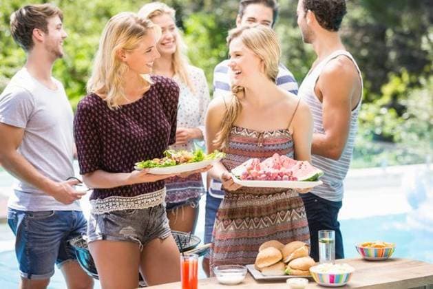 Friends preparing for outdoors barbecue party Friends preparing for outdoors barbecue party near pool, model released, , property released, Cape Town, South Africa, 03.11.2015, 690230.jpg, friend, friendship, casual clothing, swimming pool, poolside, sunny, summer, bright, resort, standing, smiling, cheerful, glass, juice, fruit juice, beverage, refreshment, grill, bbq, meal, cooking, meat, barbecue, lunch, tongs, preparing, attractive, beautiful, handsome, fashion, stylish, carefree, escapism, holiday, vacation, leisure, lifestyle, luxury, recreation, travel, happy, enjoyment, fun, together 20s, Young Adult, Man, Male, Caucasian, Woman, Female, 25-29 Years, Young Men, Caucasian Ethnicity, 20-24 Years, Young Women Outdoors,Focus on Foregro