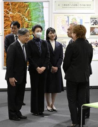 Japan imperial family s trip to Fukushima Japan s Emperor Naruhito (L), Empress Masako (2nd from L) and their daughter Princess Aiko (3rd from L) talk with people affected by the Great East Japan Earthquake at a memorial museum in Futaba, a town in Fukushima Prefecture that co-hosts the crippled Fukushima Daiichi nuclear power plant, on April 6, 2026. Fifteen years after the earthquake, tsunami and nuclear disasters that struck northeastern Japan in March 2011, they are visiting the prefecture to see the recovery efforts firsthand.  A14AA0005440248P