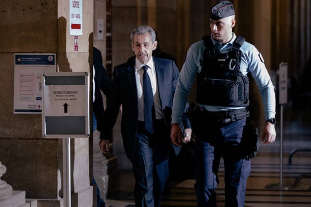 Former France s President Nicolas Sarkozy arrives for his appeal trial over charges he sought Libyan financing for his 2007 election, at the Palais de Justice courthouse in Paris on April 7, 2026. The Paris Criminal Court in September 2025 convicted Sarkozy of criminal conspiracy and handed him a 5-year prison sentence over what it said was a scheme to acquire funding from Muammar Gaddafi s Libya for his 2007 presidential run that saw him elected. The right-wing politician -- who has denied any wrongdoing -- entered a Paris jail in October 2025, serving 20 days before he was released under judicial supervision.  Copyright: xx
