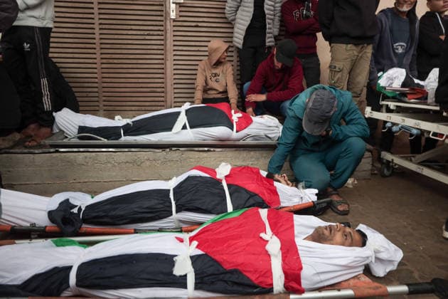 Palestinians hold funeral for victims of Israeli attack in Gaza DEIR AL BALAH, PALESTINE - APRIL 07: (EDITOR S NOTE: Image depicts death) Relatives mourn as the bodies of Palestinians killed in an Israeli airstrike targeting civilians gathered east of the Maghazi Refugee Camp in central Gaza are taken from the morgue of Al-Aqsa Martyrs Hospital in Deir al-Balah for funeral prayers and burial, following an attack that reportedly violated the ceasefire agreement in Deir Al Balah, Palestine on April 07, 2026. Abdalhkem Abu Riash Anadolu Deir Al Balah Palestine. Editorial use only. Please get in touch for any other usage.  Copyright: x2026xAnadoluxAbdalhkemxAbuxRiashx