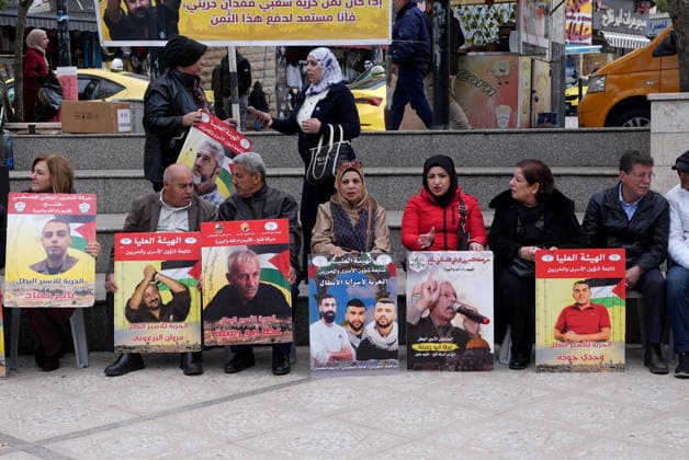 Support rally for Palestinian detainees held in Ramallah RAMALLAH, PALESTINE - APRIL 07: A group gathers in front of the Red Cross building to show support for Palestinian detainees held in Israeli prisons, in Ramallah, West Bank, Palestine, on April 07, 2026. Participants hold photographs of the detainees during the demonstration, calling attention to their situation and expressing solidarity. Issam Rimawi Anadolu Ramallah Gaza. Editorial use only. Please get in touch for any other usage.  Copyright: x2026xAnadoluxIssamxRimawix