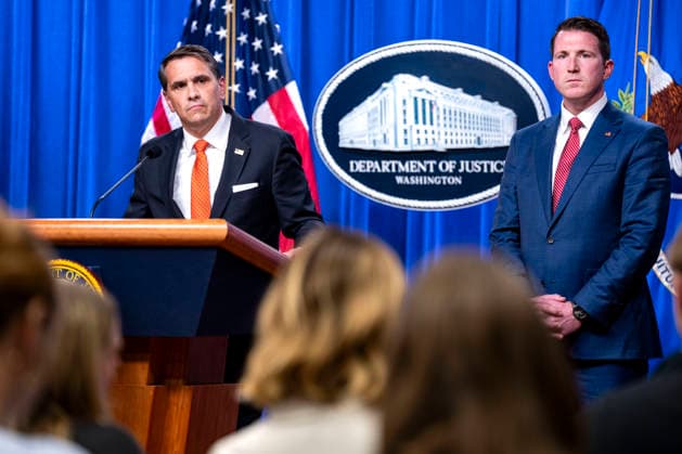 Assistant Attorney General for the Fraud Division Colin McDonald looks on as Acting Attorney General Todd Blanche takes questions during a press conference on the Trump Administration s efforts to combat fraud at the Department of Justice Headquarters in Washington, DC on Tuesday, April 7, 2026. Last week, President Donald Trump fired Attorney General Pam Bondi over her handling of the Epstein files and the lack of investigation into individuals he felt should face criminal charges. Deputy Attorney General Todd ?Blanche, a former personal lawyer to Trump, will lead the Justice Department temporarily.  WAP20260407316 BONNIExCASH