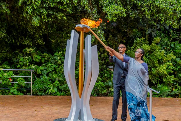 (260407) -- KIGALI, April 7, 2026 -- Rwandan President Paul Kagame and first lady Jeannette Kagame light the Flame of Remembrance during a commemoration event of the 32nd anniversary of the 1994 genocide against the Tutsi in Kigali, Rwanda, on April 7, 2026. Rwandan President Paul Kagame on Tuesday emphasized the importance of confronting denial and preserving historical truth as the country began a week of national mourning and 100 days of commemoration to mark the 32nd anniversary of the 1994 genocide against the Tutsi. (Photo by Xinhua) RWANDA-KIGALI-COMMEMORATION-1994 GENOCIDE AGAINST TUTSI CyrilxNdegeya 