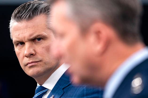 Secretary of Defense Pete Hegseth looks on as Chair of the Joint Chiefs of Staff Dan Caine speaks during a press briefing at the Pentagon in Arlington, Virginia on Wednesday, April 8, 2026. Yesterday, the United States and Iran agreed to a two-week ceasefire, with the U.S. suspending bombing in Iran for two weeks if the country reopens the Straight of Hormuz.  ARL20260408326 BONNIExCASH