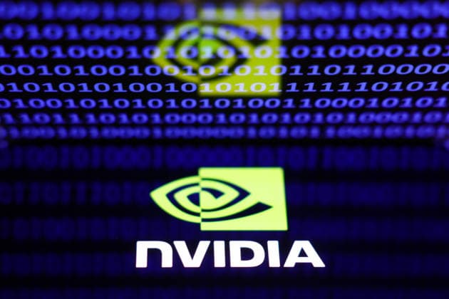 AI Photo Illustrations A binary code displayed on a laptop screen and Nvidia logo displayed on a phone screen are seen in this illustration photo taken in Krakow, Poland on April 8, 2026. Krakow Poland  Copyright: xJakubxPorzyckix originalFilename: porzycki-aiphotoi260408_npIoO.jpg
