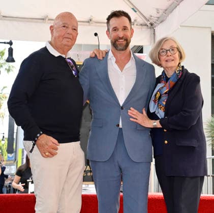 American actor, director and writer Noah Wyle is joined his father Stephen Wyle (L) and mother Majorie Speer during an unveiling ceremony honoring him with the 2,840th star on the Hollywood Walk of Fame in Los Angeles on Thursday, April 9, 2026.  LAP20260409925 JIMxRUYMEN