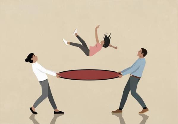 Parents holding safety net under falling daughter  Copyright: MaltexMueller fStopImages2097023