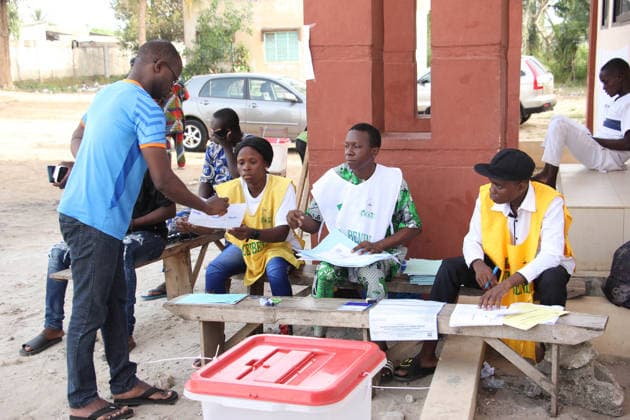 (260412) -- COTONOU, April 12, 2026 -- Staff members work at a polling station in Ouidah, Benin, on April 12, 2026. Polling stations opened at 7:00 a.m. local time (0600 GMT) on Sunday in Benin for an election to choose the country s next president. (Photo by Xinhua) BENIN-PRESIDENTIAL ELECTION-VOTE SeraphinxZounyekpe 
