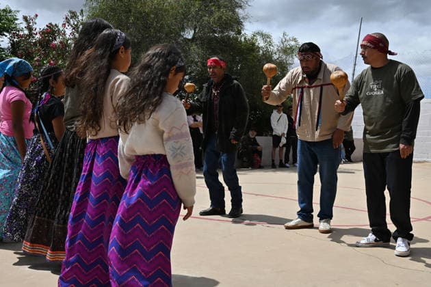 April 12, 2026, Tecate, Baja California, Mexico: Members of native communities, mainly Kumeyaay native group, during a â€oeceremony†rally against the destruction of the Kuchamaa Mountain left by the construction of a new border wall at the US-Mexico Border in Tecate, Baja California, Mexico on Sunday, April 12, 2026. The Kuchamaa Mountain is considered a sacred site by native groups living in both sides of the border. Tecate Mexico - ZUMAm180 20260412_zip_m180_003 Copyright: xCarlosxA.xMorenox